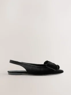 Next Velours noir - Chaussures plates Forever Comfort® à bout pointu et bride arrière à nœud Hot