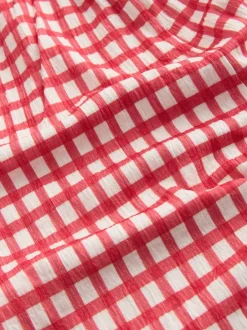 Next Vichy rouge/écru - Combinaison en jersey Effet froissé (3-16ans) Outlet